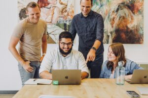 A group working on a laptop