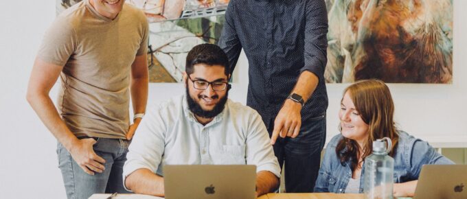 A group working on a laptop