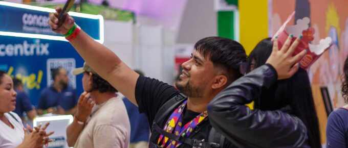 man taking a selfie at an event
