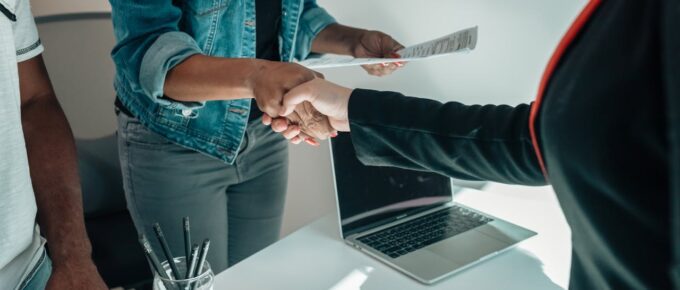 People shaking hands during an event